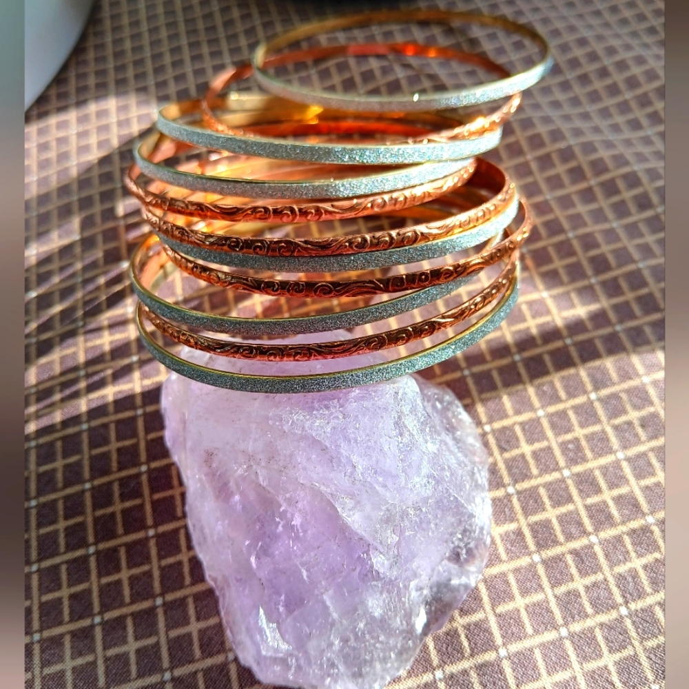 11 bangle bracelets, NWOTs.
